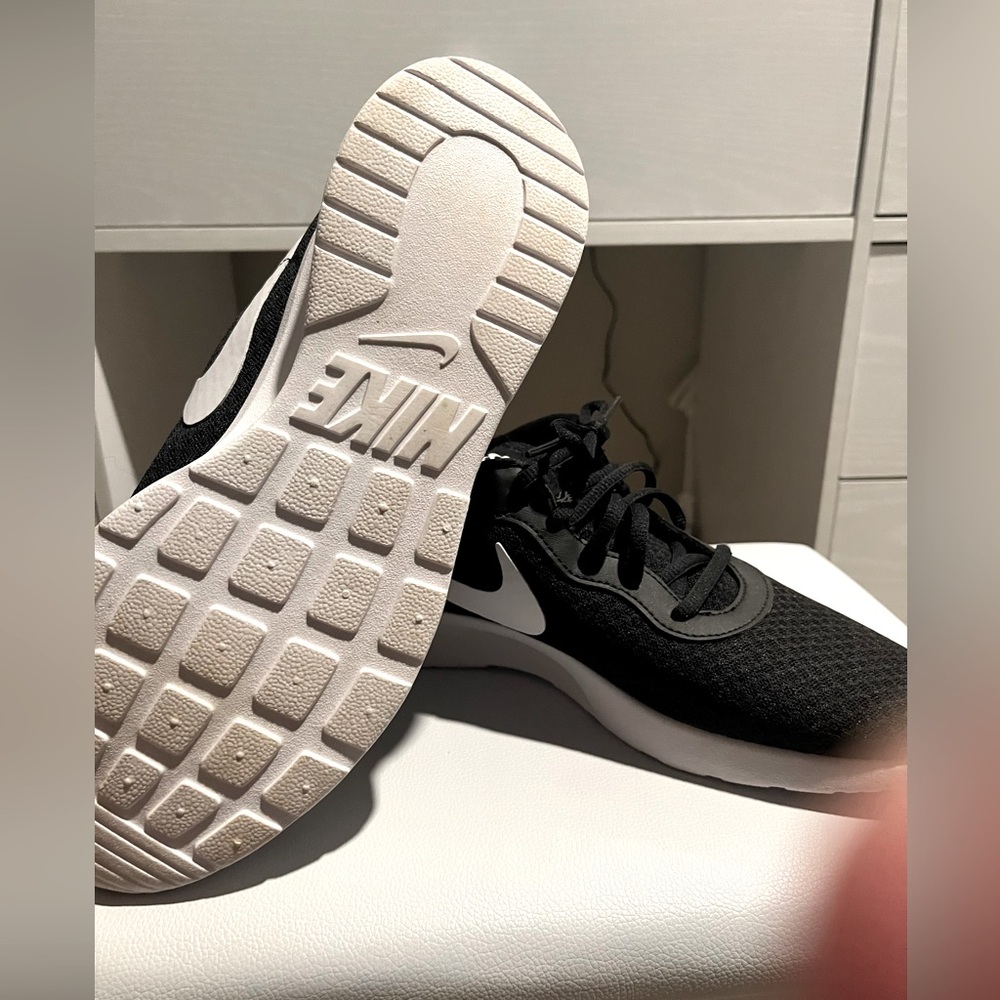 Black and white Nike shoes